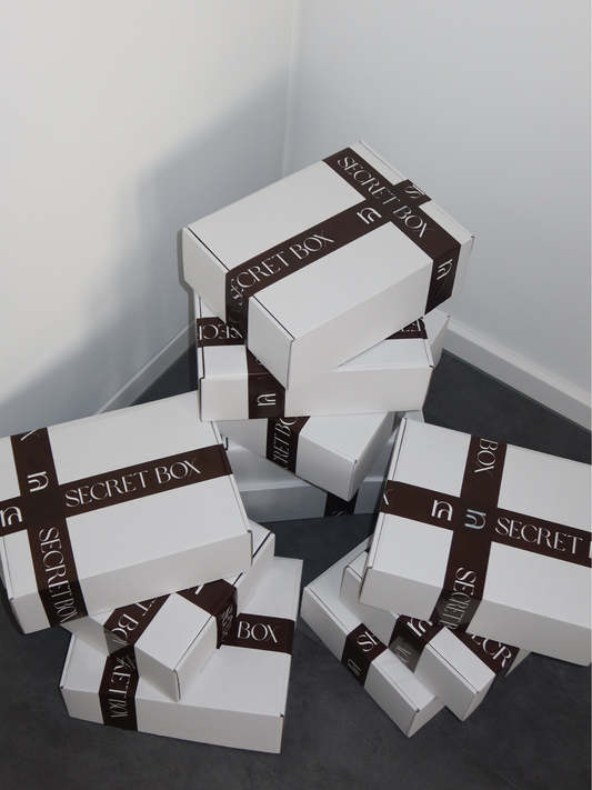 SECRET BOX • Tops
