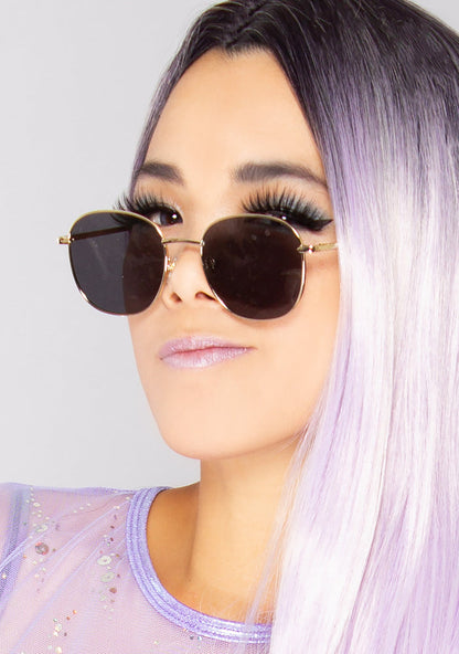 Dime Optics Avalon Sunglasses in matte gold grey — model view