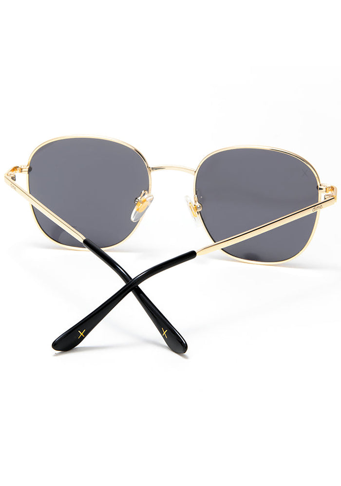 Dime Optics Avalon Sunglasses in matte gold grey — back view