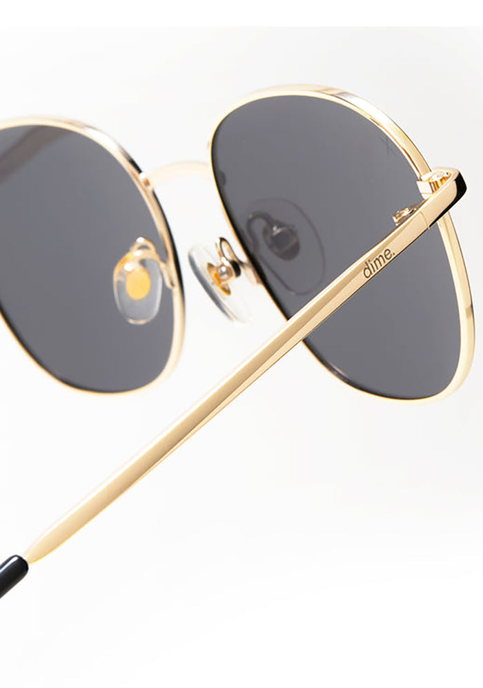 Dime Optics Avalon Sunglasses in matte gold grey — side view