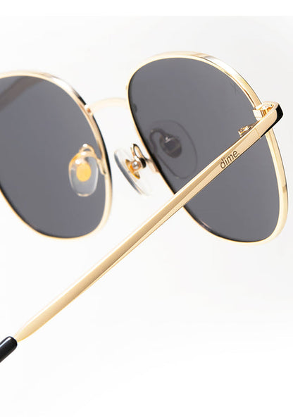 Dime Optics Avalon Sunglasses in matte gold grey — side view