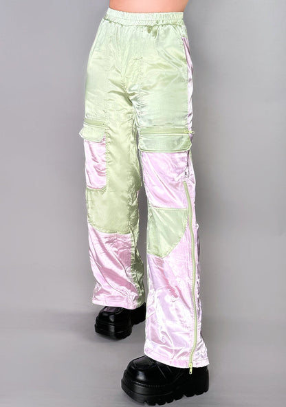 Hot & Delicious Bella Blush Colorblock Satin Cargo Pants in sage blush with two-tone colorblock look on festival rave bottoms — model view