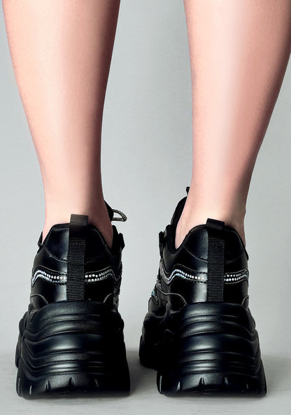 Rear view of the Berness BILLIE Darkwave black vegan leather platform sneakers on-foot, detailing the clean back heel construction and the dramatic depth of the chunky platform rubber outsole.