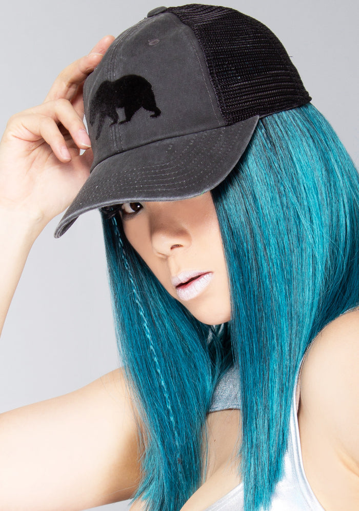 American Needle Cali Bear Raglan Bones Hat in black with velvet nubroidery California bear patch on pigment washed cotton twill festival baseball cap — model front view