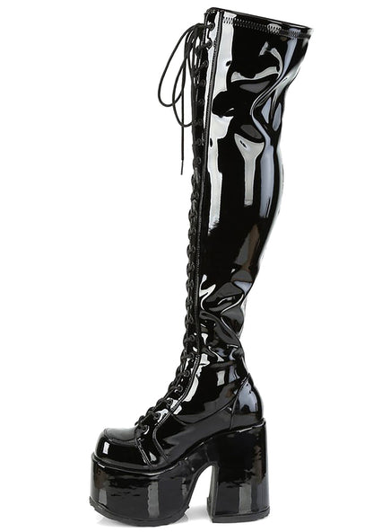 Demonia CAMEL 300 Mistress May I Patent Black Platform Boots in black patent leather showing lace-up front detail and inside zip closure — detail shot