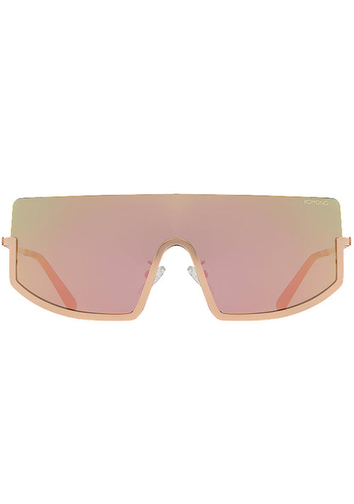 Komono CRAFTED Sonny Heat Sunglasses in pink with oversized curved frame and rose gold metal trim and pink gradient lens on festival sunglasses — front view