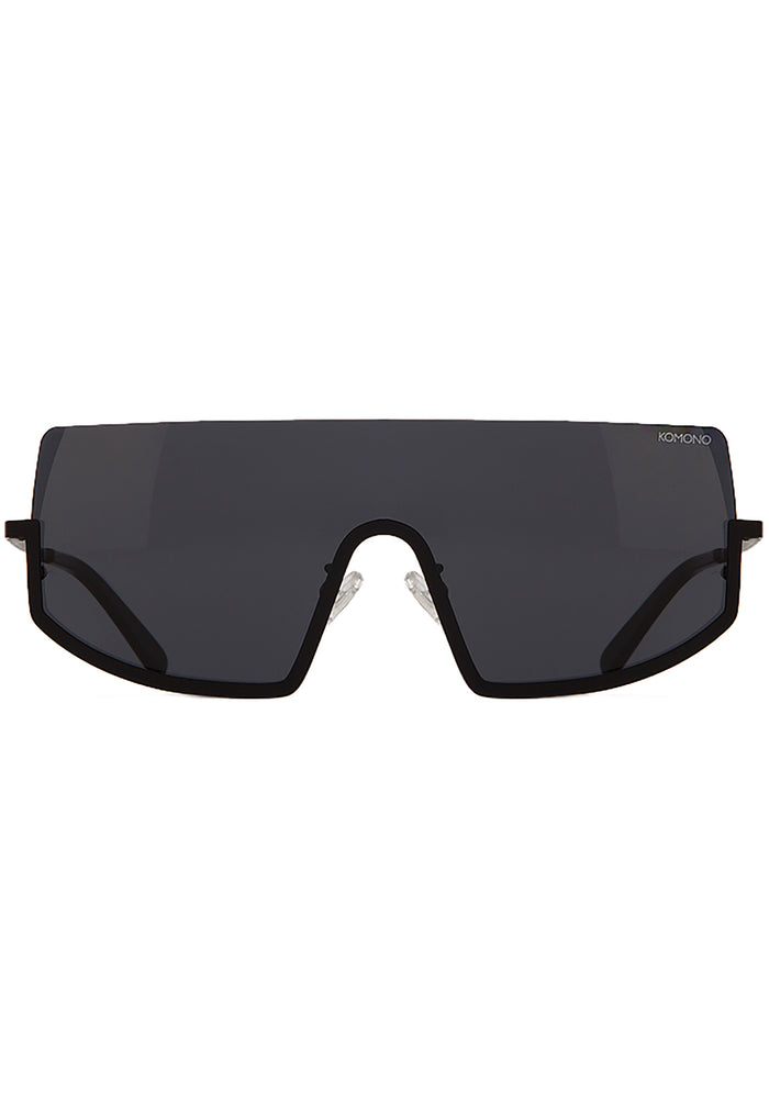 Komono CRAFTED Sonny Midnight Sunglasses in black with chic curved frame and matte black metal trim on festival sunglasses — front view
