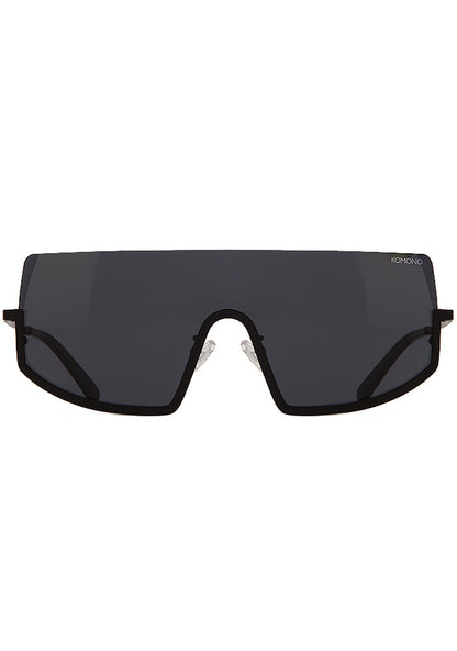 Komono CRAFTED Sonny Midnight Sunglasses in black with chic curved frame and matte black metal trim on festival sunglasses — front view