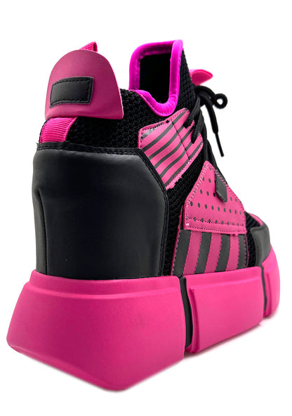On-foot rear view of Anthony Wang CRANBERRY 08 Pink Circuit platform sneakers styling showing the massive blocky tread shape and the supportive high-rise heel block from behind