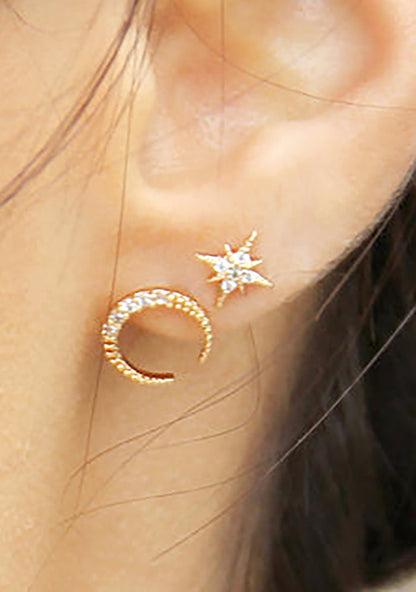 Ettika Crystal Interstellar Stud Earrings in gold — model view