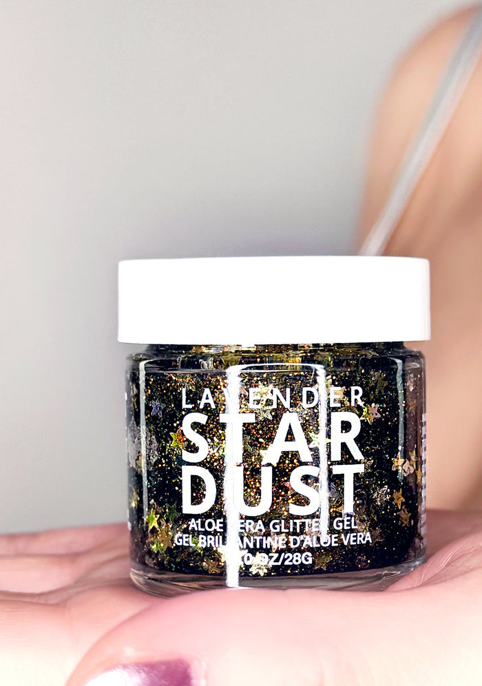 Lavender Stardust Crystal Vision Stardust Body Glitter Pot in gold — model view