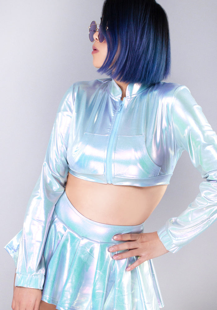 Hot & Delicious Cyber Playdate Cropped Jacket in pearlescent blue with long-sleeve crop fit on festival jacket — model view