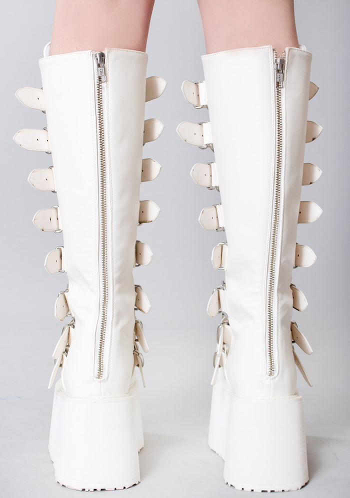 Demonia DAMNED 318 51/50 White Platform Boots in white vegan PU leather with back metal zip closure worn by model — back view