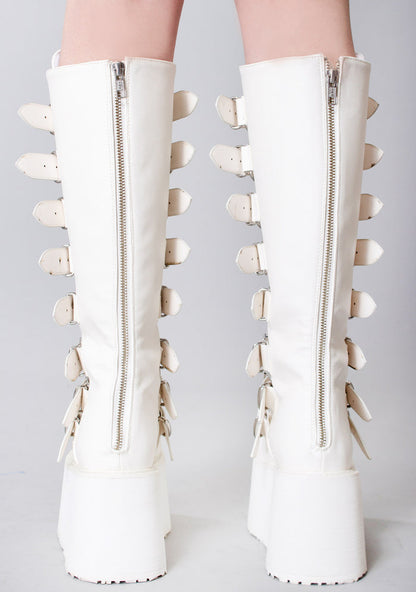 Demonia DAMNED 318 51/50 White Platform Boots in white vegan PU leather with back metal zip closure worn by model — back view