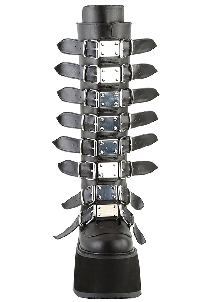 Demonia DAMNED 318 Obsession Black Platform Boots in black vegan leather showing knee high silhouette and cone studded strap detail — side view