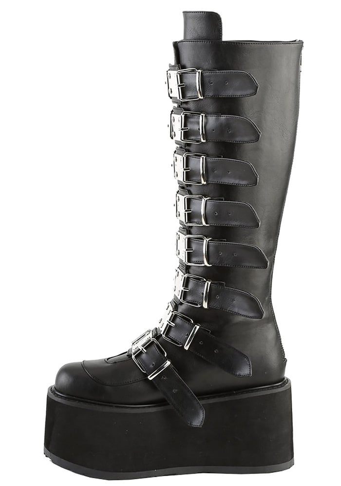 Demonia DAMNED 318 Obsession Black Platform Boots in black vegan leather showing chrome hardware buckle and EVA foam platform detail — detail shot