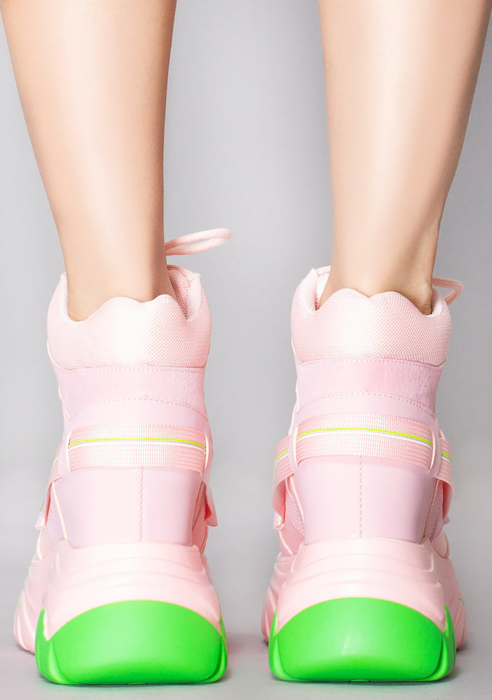 Anthony Wang DATE 01 Techno Heartbeat Platform Sneakers in pastel pink with lace-up closure and neon green paint splatter platform worn by model — back view