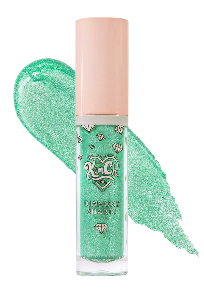 Kimchi Chic DIAMOND SHARTS Liquid Glitter Illuminator in 10 Standing Ovation mint with star glitter in twist cap bottle on rave makeup illuminator — front view