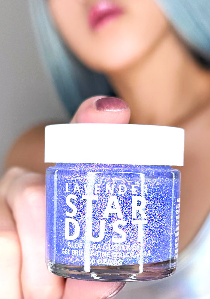 Lavender Stardust Galaxy Stardust Body Glitter Pot in purple — model view