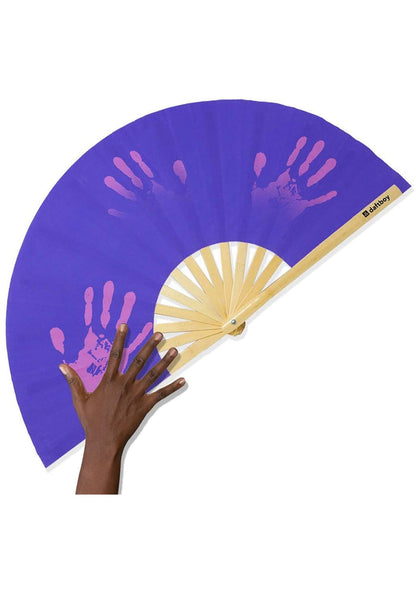 Daftboy Game Changer Color Change Rave Fan in purple pink with heat reactive fabric on eco-friendly bamboo festival fan — front view