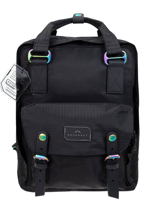 Doughnut Official Gamescape Series Macaroon Backpack in black with iridescent hardware and water-resistant exterior on festival backpack — front view