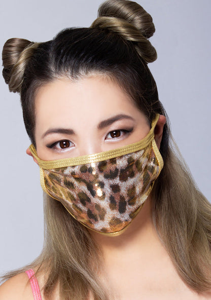 BGlittz Golden Cheetah Dust Mask in metallic gold with all-over cheetah print on metallic gold nylon rave festival face mask — model view