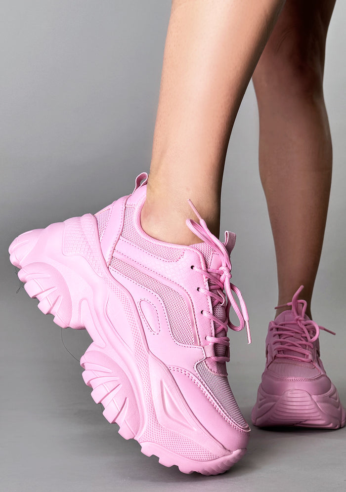 Front view of the pink HANNA Kawaii Kandy platform sneakers on-model, showing the pink laces and wide toe box.