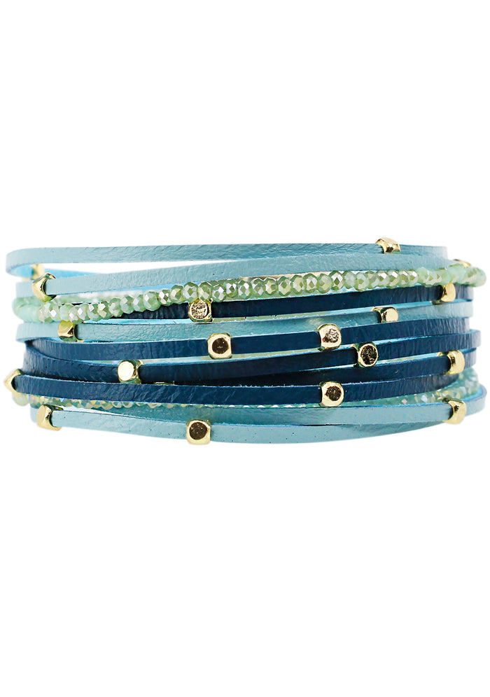 Erimish In The Clouds Multi Strand Bracelet in blue with leather wrap and turquoise glass beaded strands on festival bracelet — front view