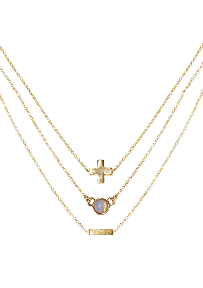 Charged Journey Opal Delicate Chain Necklace Set in gold with raw opal stone on three 18k gold plated chain crystal festival necklace set — front view