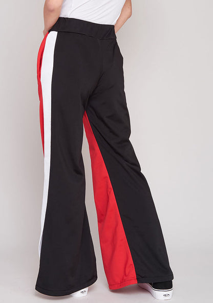 The Ragged Priest Jux Jogger Pants in red multi — back view