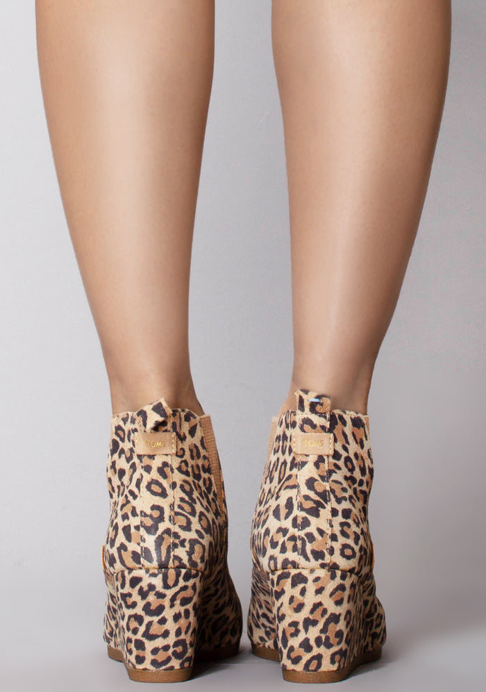 TOMS Kelsey Suede Boot in leopard with all-over leopard print on suede wedge heel festival ankle boot — model back view