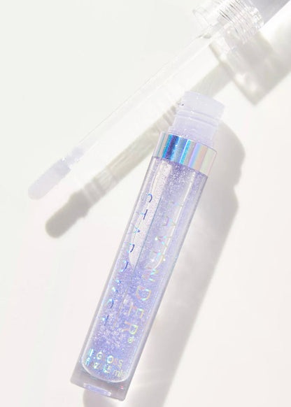 Lavender Stardust Lilac Sparkle Cosmic Lip Gloss in light purple — model view