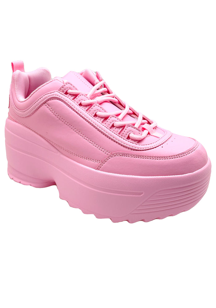 Studio product shot of the Berness LILY 5005 Sugar Pop pink platform sneakers from a three-quarters front angle, emphasizing the clean round toe design and uniform pastel pink colorway.