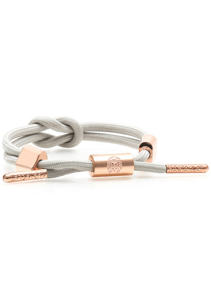 Rastaclat Lotus II Women's Knotaclat Bracelet in grey rose gold with nautical knot design and rose gold hardware on festival bracelet — front view