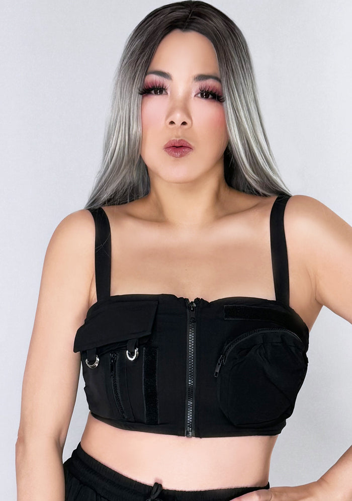 Hot & Delicious Metro Chic Black Cargo Crop Top in black with cargo zippered front pockets on urban rave top — model view