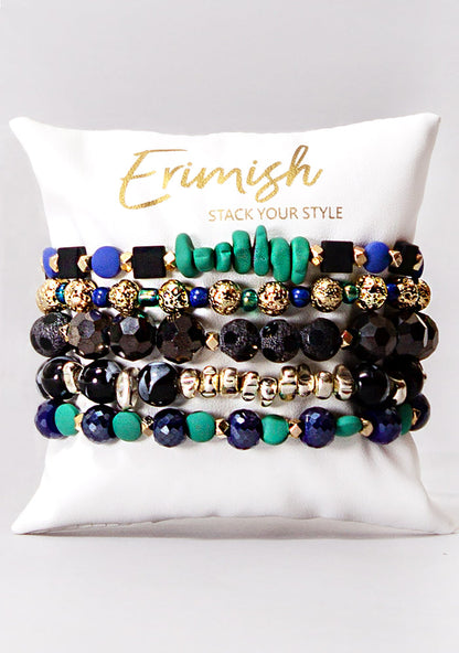 Erimish Midnight Masquerade Bracelet Stack in black green blue-violet with mystical beads on festival bracelet stack — front model view