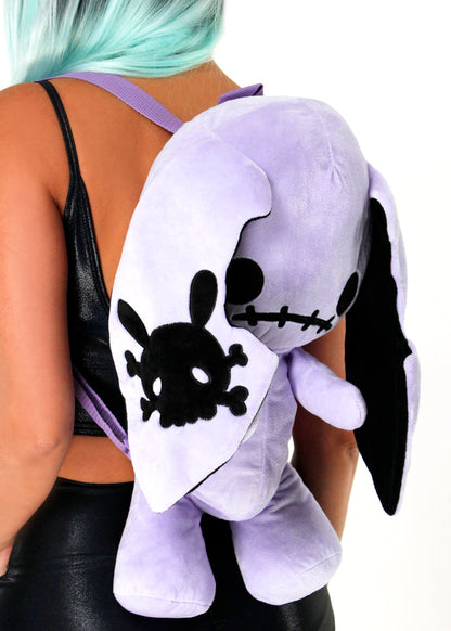 Sleepyville Critters Naughty Bunny Purple Plush Backpack in purple with 3D bunny plush and skull patch ear accent on kawaii goth rave backpack — model side view