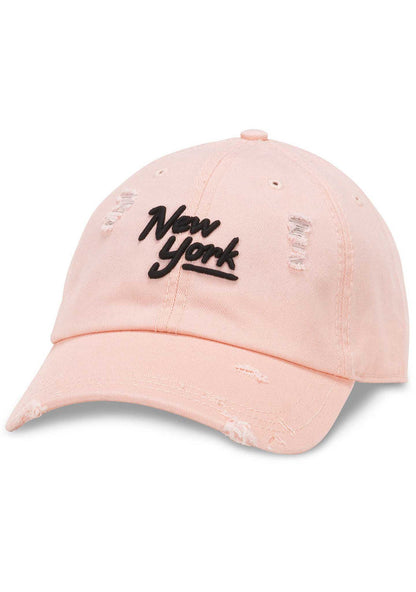 American Needle New York Shred Slouch Raglan Hat in baby pink with embroidered New York logo and distressed detail on cotton twill festival baseball cap — front view