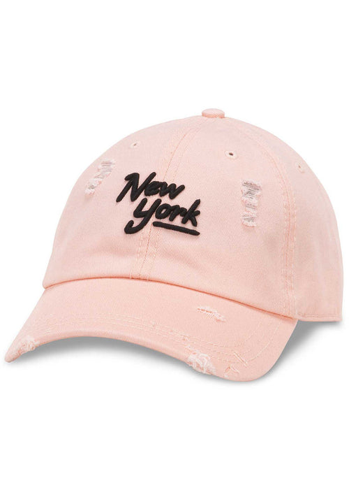 American Needle New York Shred Slouch Raglan Hat in baby pink with embroidered New York logo and distressed detail on cotton twill festival baseball cap — front view