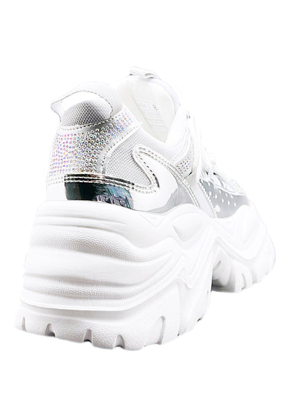 Rear quarter studio view of Berness NIKKI platform sneaker highlighting the stacked white wavy sole and shimmering rhinestone heel accents.
