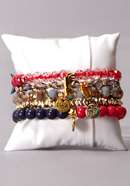Erimish Peppermint Schnapps Bracelet Stack in red gold grey with sparkling beads on festival bracelet stack — back model view