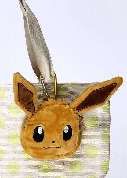 Pokemon Eevee Plush Coin Pouch in brown with full front embroidered Eevee design and wristlet strap — detail view