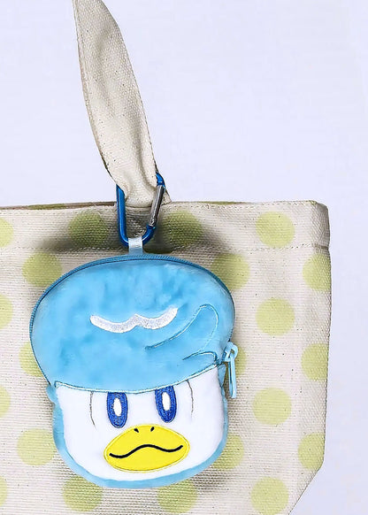 Pokemon Quaxly Plush Coin Pouch in blue with full front embroidered Quaxly design and wristlet strap — detail view