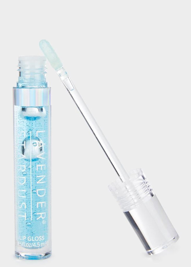 Lavender Stardust Pool Sparkle Cosmic Lip Gloss in light blue — model view