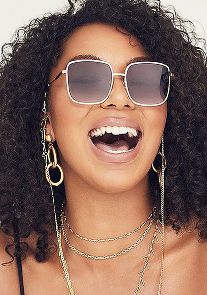 Quay Australia Real One Sunglasses in gold smoke — model view