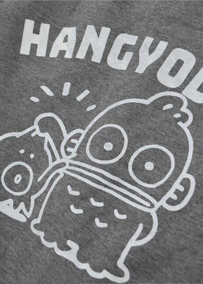 Sanrio Hangyodon Sherpa Zip Up Hoodie in charcoal with Hangyodon embroidery on sherpa-lined zip-up rave festival jacket — sherpa lining detail