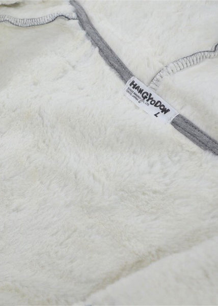 Sanrio Hangyodon Sherpa Zip Up Hoodie in charcoal with Hangyodon embroidery on sherpa-lined zip-up rave festival jacket — embroidery detail view