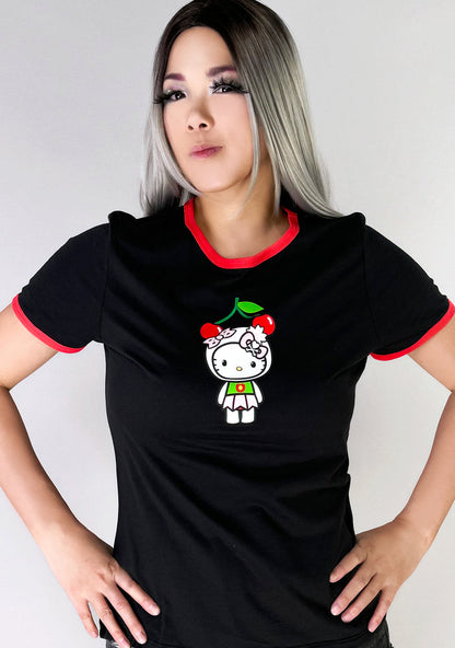 tokidoki x Sanrio Hello Kitty Cherry Kitty Ringer Tee in black red with cherry Hello Kitty graphic and contrast red binding on cotton kawaii rave tee — model front view