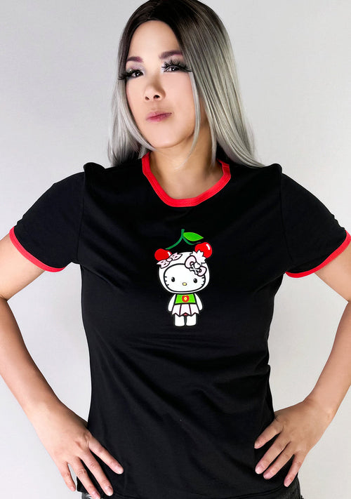 tokidoki x Sanrio Hello Kitty Cherry Kitty Ringer Tee in black red with cherry Hello Kitty graphic and contrast red binding on cotton kawaii rave tee — model front view
