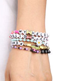 Bioworld Sanrio Hello Kitty and Friends 5pc Kandi Bracelet Set in multi — model view